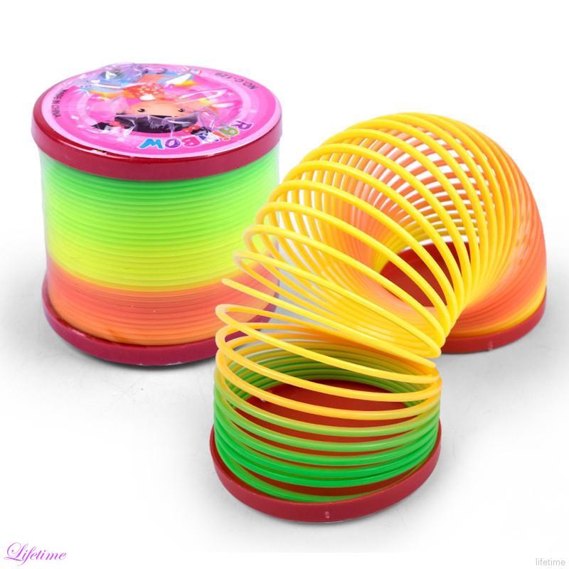 LLAni Juguete Clásico Del Desarrollo De Los Niños De Slinky De Los Niños Mágicos Plásticos Del Arco Iris Colorido 