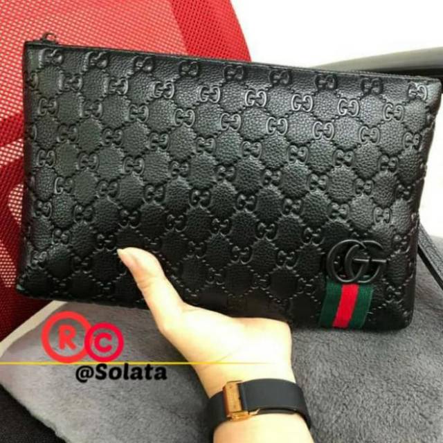 bolsa de mano para hombre gucci