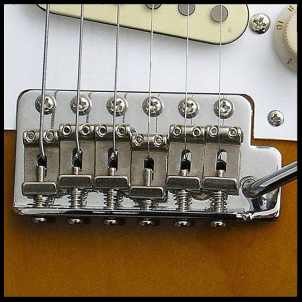 Регулировка анкера грифа гитары yamaha f310. Дребезжат струны на гитаре. Отстройка гитары. Как отрегулировать электрогитару. Дребезжат струны на электрогитаре.